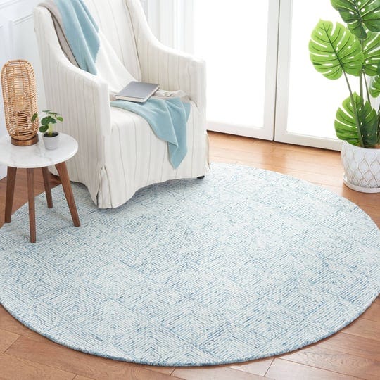 safavieh-6-x-6-ft-abstract-blue-ivory-hand-tufted-round-rug-1