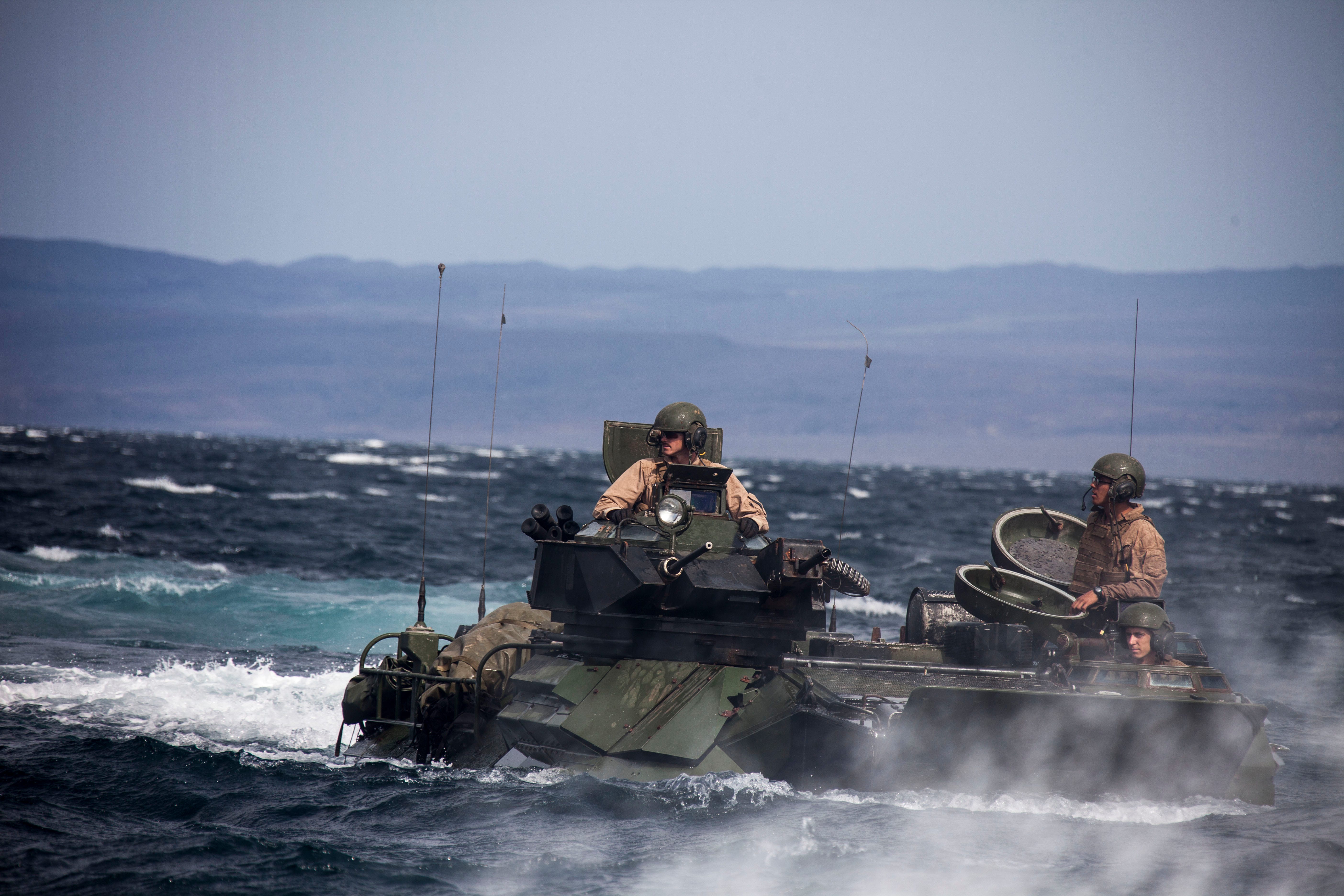 U.S. Marines assigned to Amphibious Assault Vehicle (AAV) Platoon, Company K, Battalion Landing Team 3/2, 26th Marine Expeditionary Unit (MEU), practice AAV recovery during sustainment training in Djibouti, Aug. 5, 2013. The 26th MEU is a Marine Air-Ground Task Force forward deployed to the U.S. 5th Fleet area of responsibility aboard the Kearsarge Amphibious Ready Group serving as a sea-based, expeditionary crisis response force capable of conducting amphibious operations across the full range of military operations. (U.S. Marine Corps photo by Staff Sgt. Edward Guevara/Released)