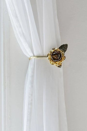 rosette-curtain-tie-back-set-in-gold-at-urban-outfitters-1