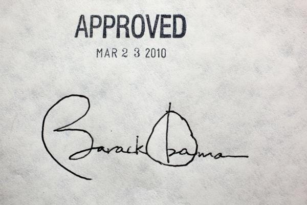 Obama Signs Health Care Legislation