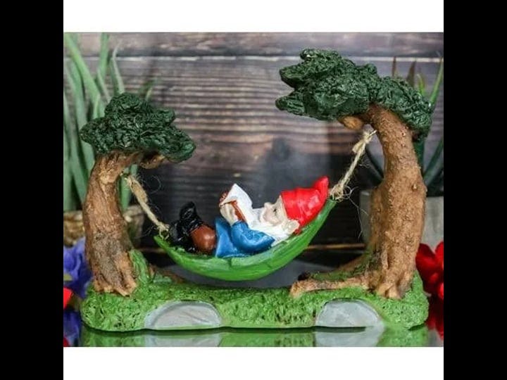 whimsical-bookworm-gnome-sleeping-on-hammock-by-forest-trees-figurine-decor-1