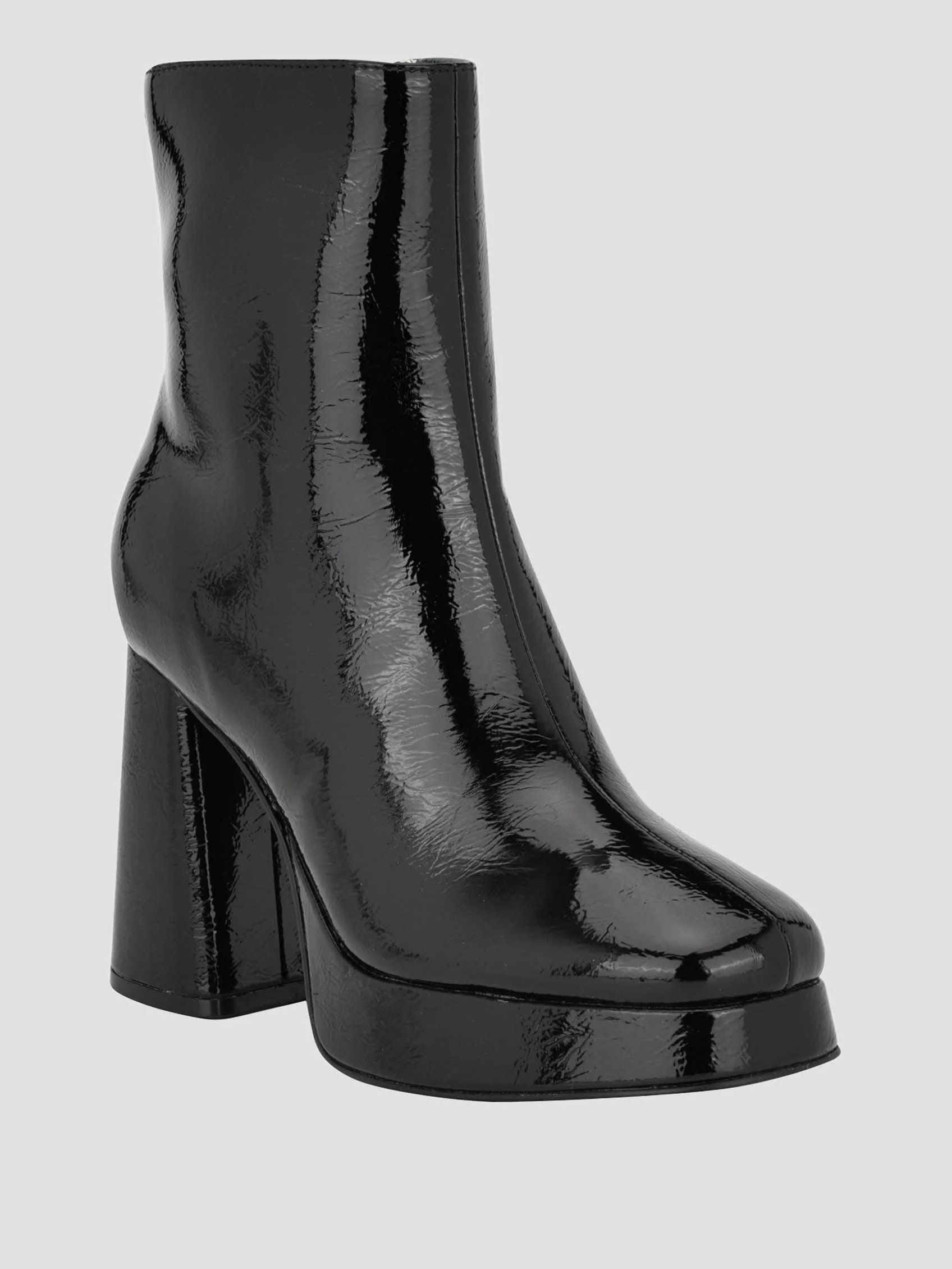Polished Black Platform Heels for a Bold Look | Image
