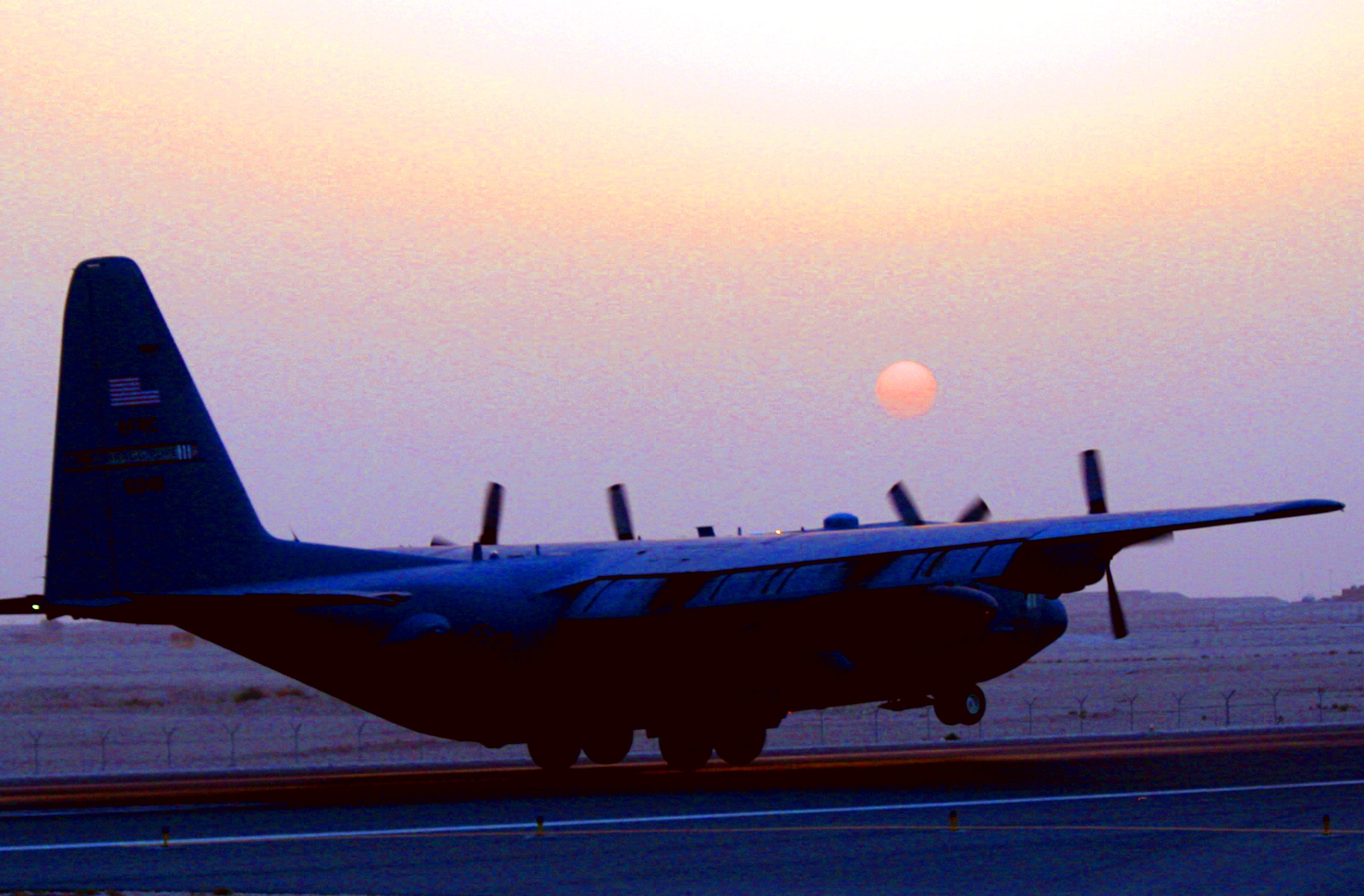 A C-130 Hercules assigned to the 379th Air Expeditionary Wing at a non-disclosed location in Southwest Asia returns from a combat airlift mission June 7. The 379th AEW supports operations New Dawn and Enduring Freedom and the Combined Joint Task Force-Horn of Africa.