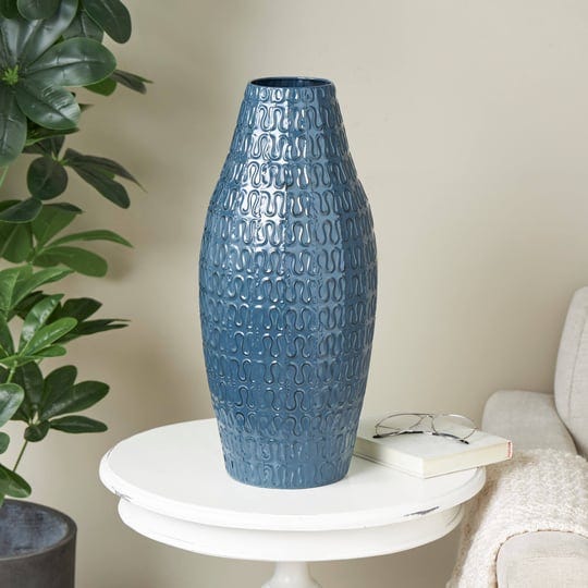 dark-blue-metal-dimensional-textured-vase-with-wavy-pattern-1