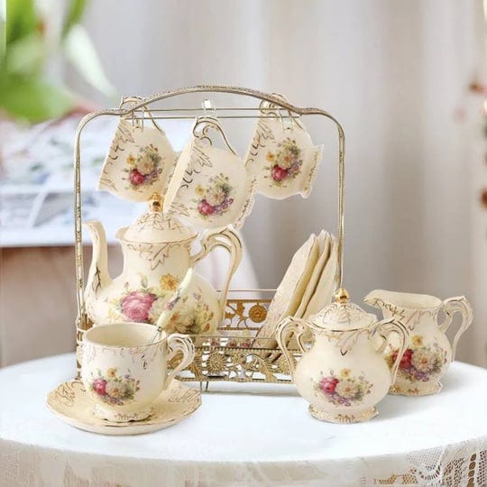ufengke-11-piece-creative-european-luxury-tea-set-ivory-porcelain-ceramic-coffee-set-with-metal-hold-1