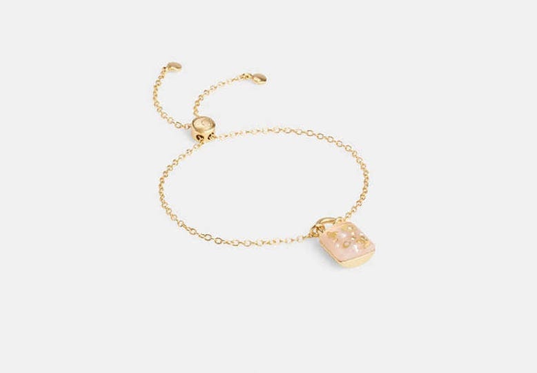 coach-outlet-resin-padlock-slider-bracelet-womens-bracelets-gold-pink-1