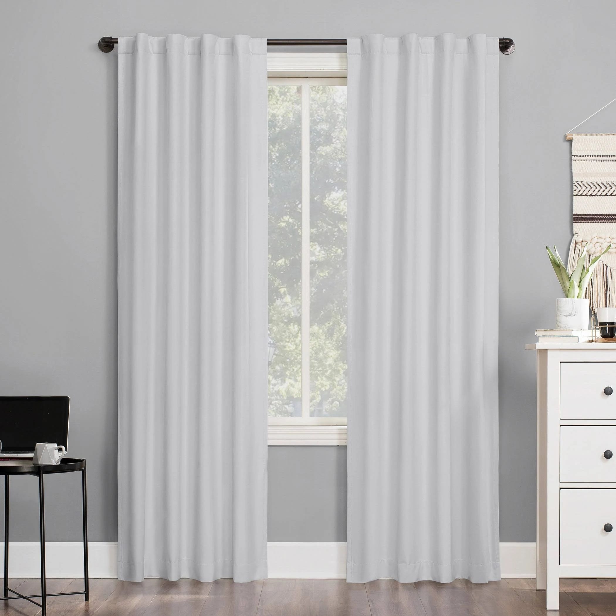 Sun Zero Total Blackout White Back Tab Curtain Panels for Energy Efficiency and Privacy | Image