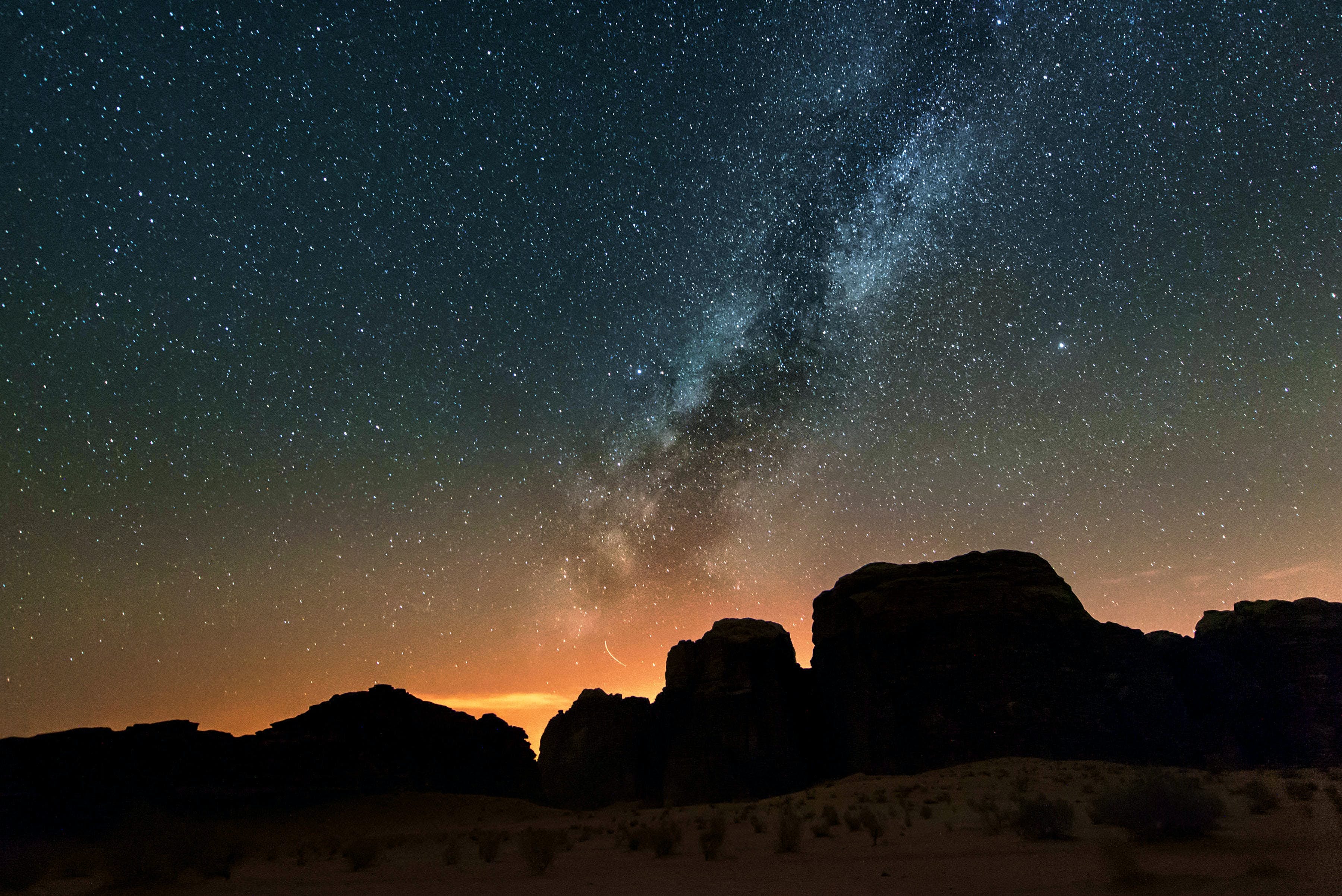 Milky way above red Wadi Rum desert in Jordan.