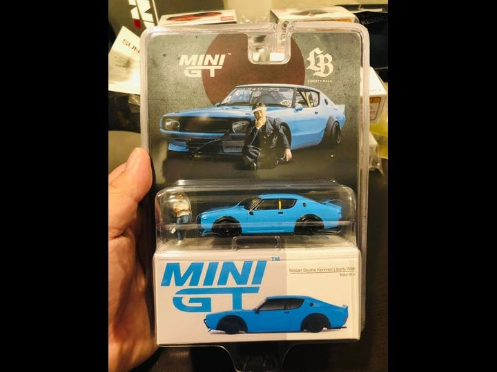 mini-gt-653-tokyo-auto-salon-2024-exclusive-nissan-skyline-kenmeri-liberty-walk-baby-blue-1