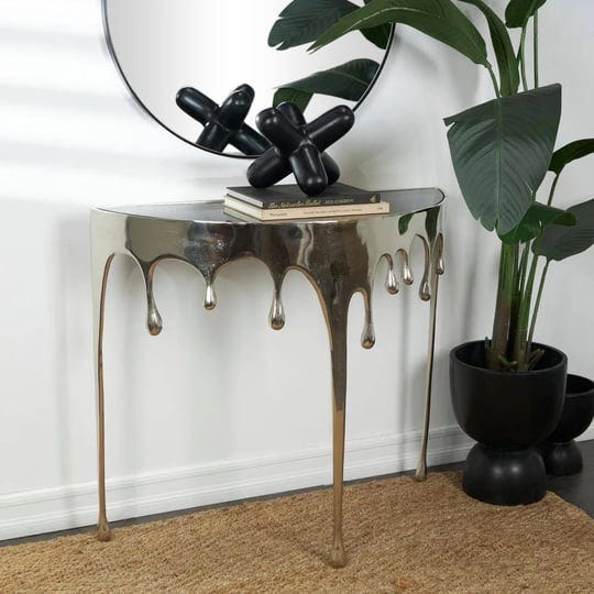 32-25-in-silver-medium-half-moon-glass-aluminum-drip-console-table-with-melting-designed-legs-and-sh-1