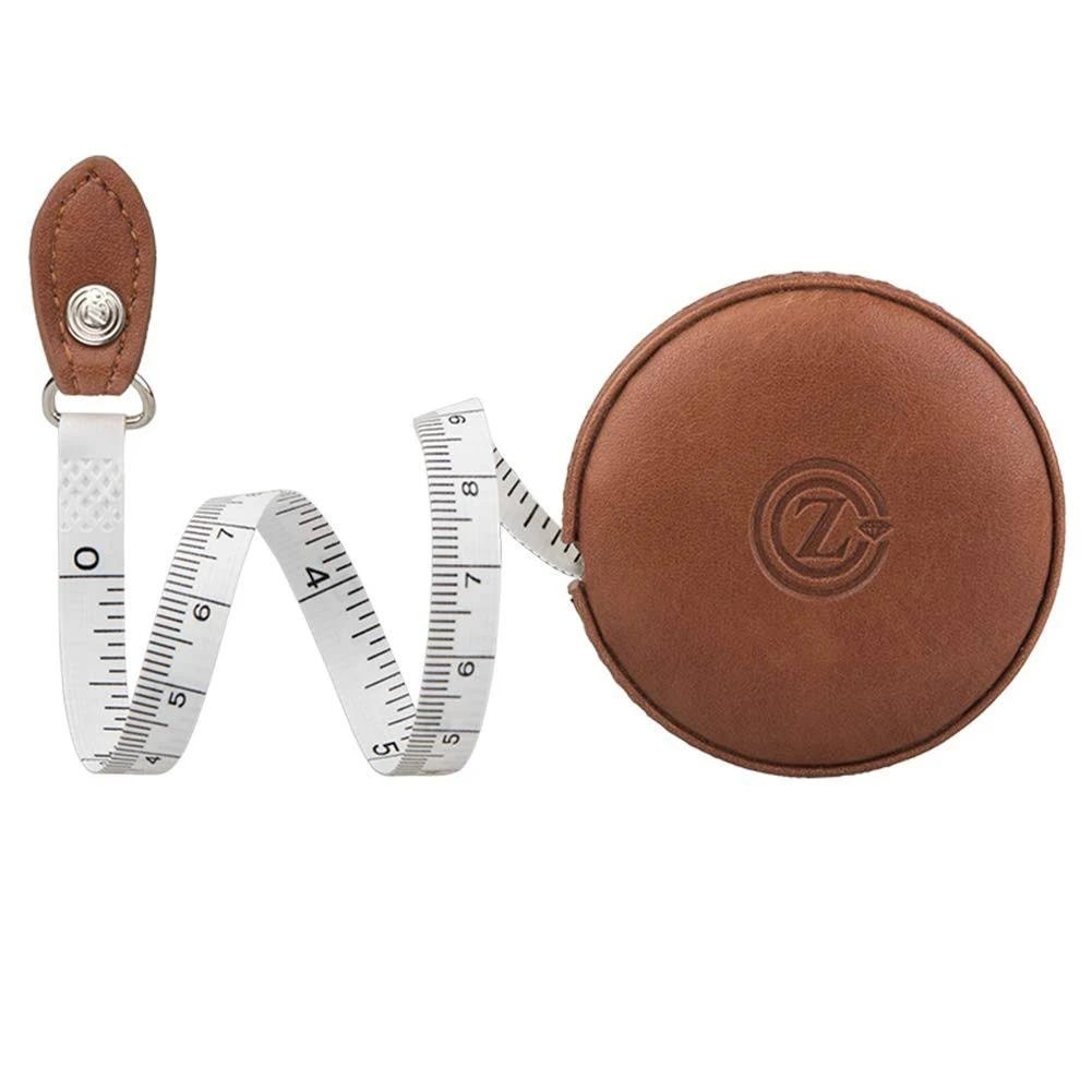 Easy-to-Use Fiberglass Fabric Tape Measure with Leather Case and Push Button Lock | Image