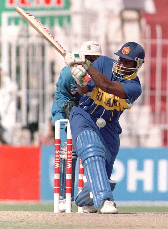 Sri Lanka's Sanath Jayasuriya swings to the leg side, watched by England wicketkeeper Jack Russell