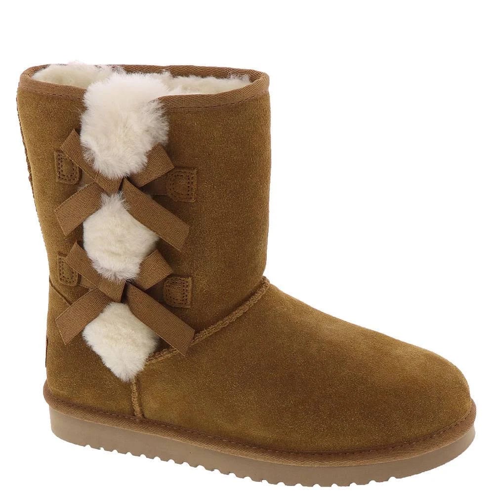 Sleek Wool-Lined Suede Boot with Faux Fur and Sheepskin Inner Comfort | Image