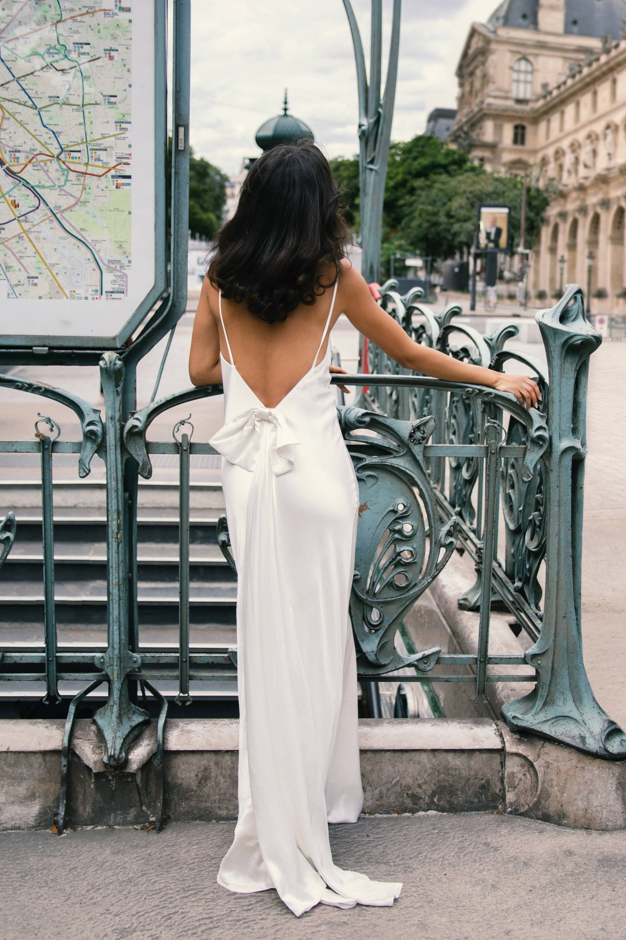 Open Back Gown with Detachable Bow Train in White | Image
