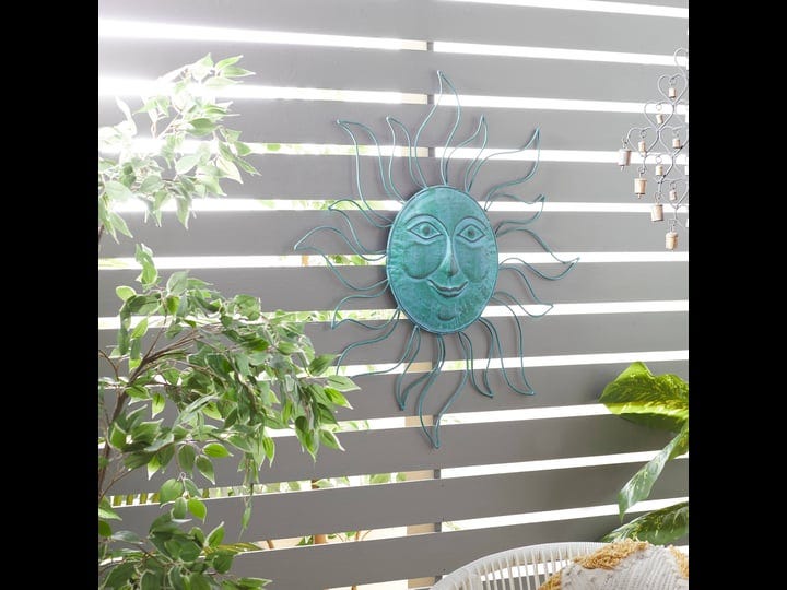 metal-sunface-wall-decor-in-light-blue-finish-1