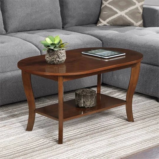 pemberly-row-oval-coffee-table-with-shelf-in-espresso-wood-finish-1