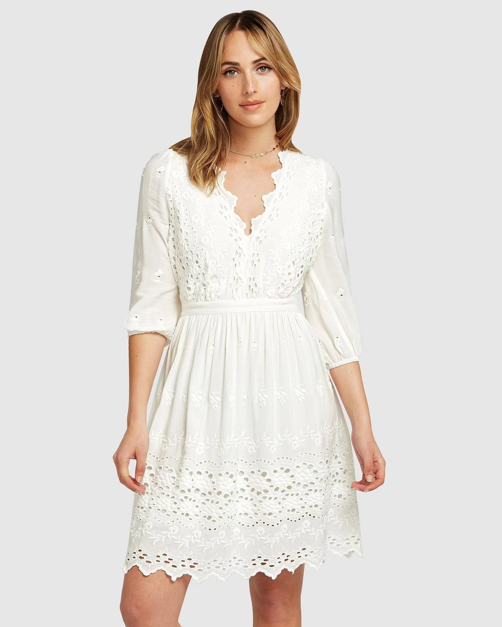 Bohemian White Eyelet Mini Dress with Scalloped Detail | Image