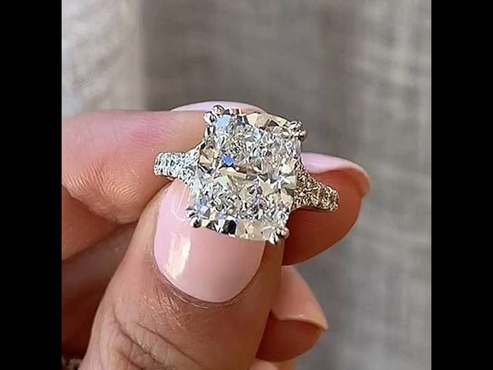 outstanding-split-shank-crushed-ice-cushion-cut-engagement-ring-1