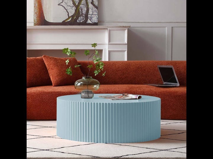 contemporary-round-coffee-table-with-handcrafted-relief-light-blue-1