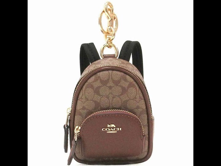 coach-outlet-mini-court-backpack-bag-charm-in-signature-canvas-beige-1