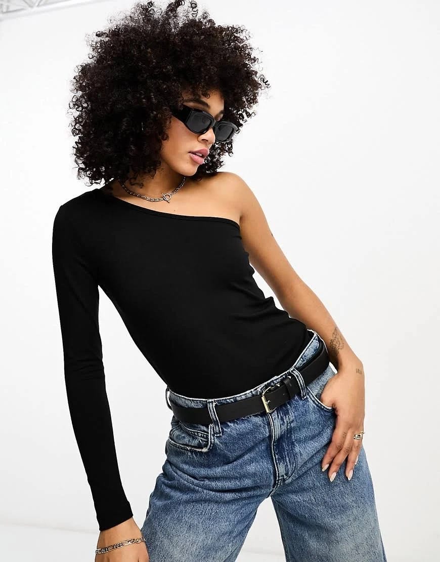Stylish black one-shoulder top for a sleek look | Image
