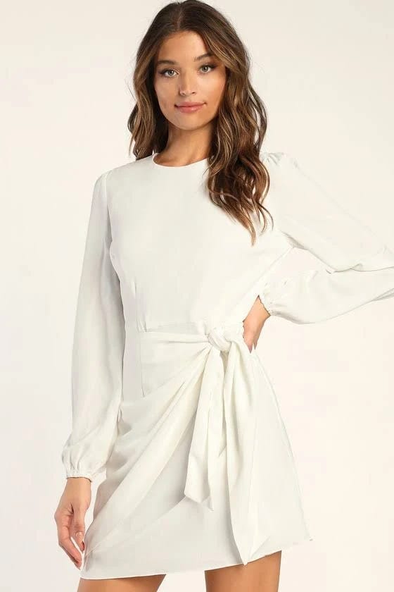 Stylish white long sleeve tie-front skater dress for a flattering fit | Image