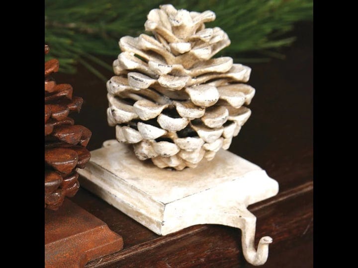 the-holiday-aisle-pinecone-stocking-holder-color-cast-iron-white-1