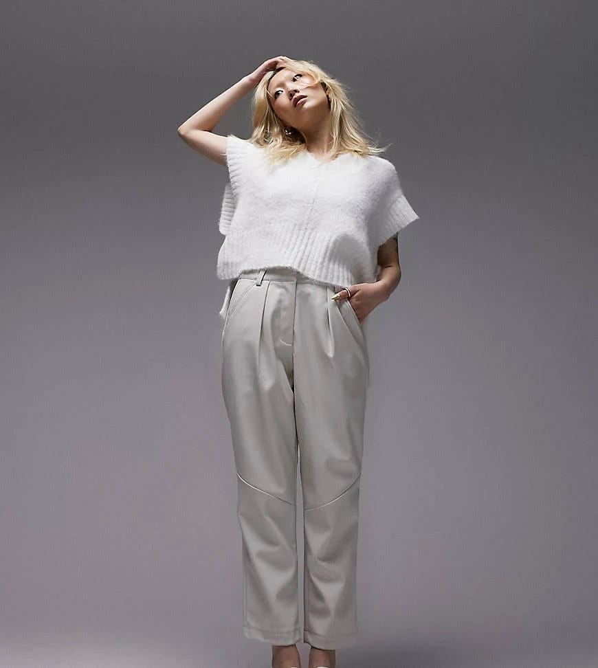 Sleek White Leather Pants with Crisp Pleats | Image