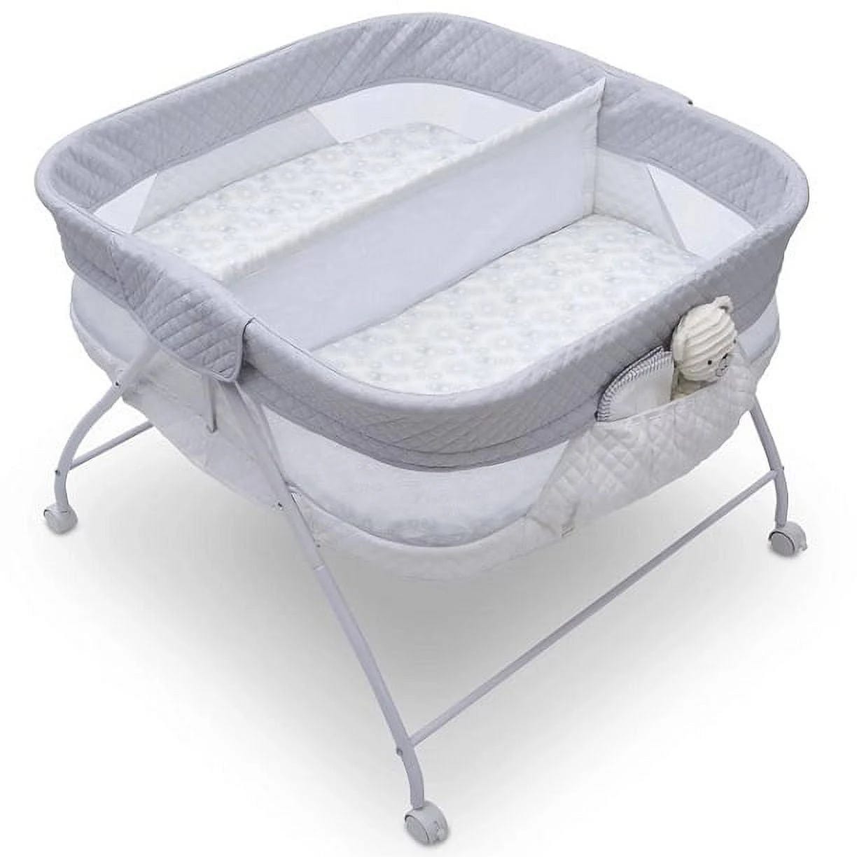 Delta Children Aqua Geo Travel Double Bassinet | Image