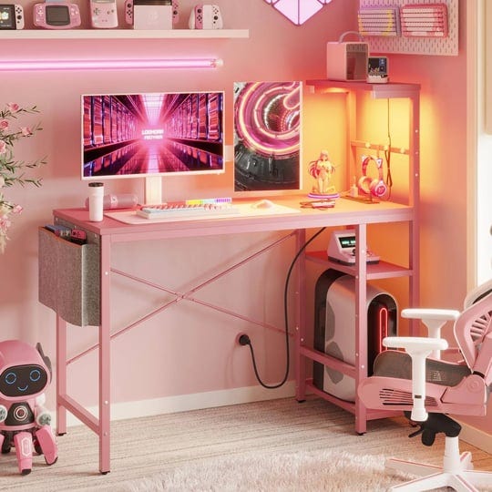 bestier-pink-gaming-desk-with-power-outlets-44-inch-led-gamer-desk-with-4-tiers-reversible-shelves-p-1