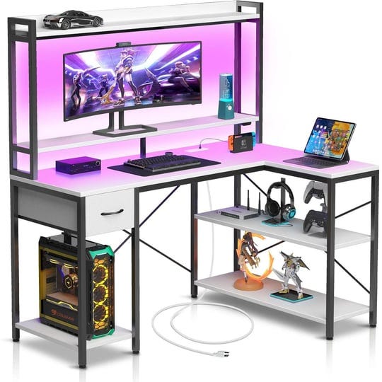 seventable-l-shaped-gaming-desk-with-led-lights-power-outlets-reversible-computer-desk-with-shelves--1