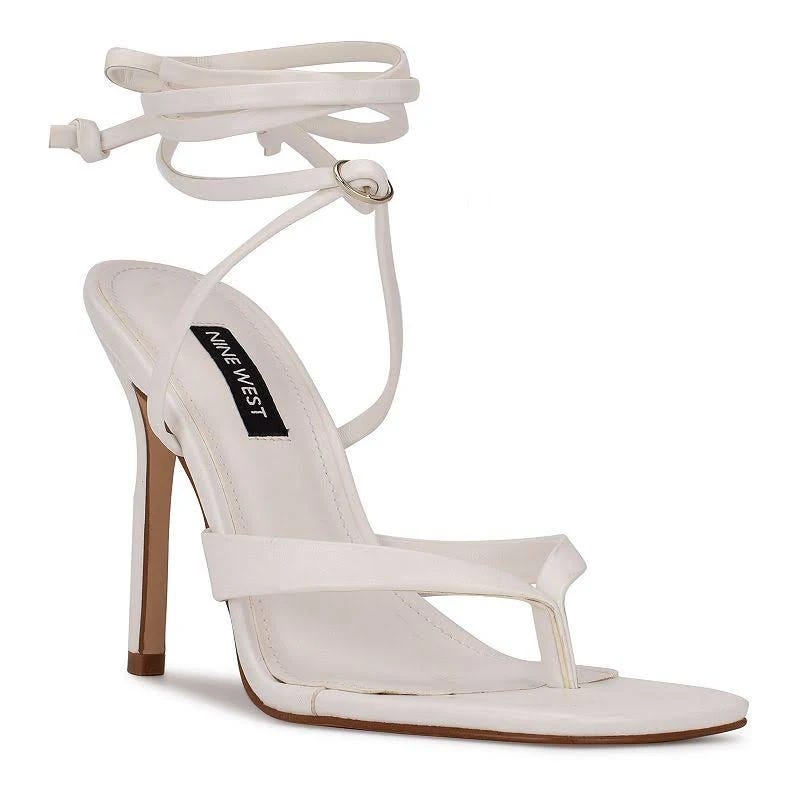 Glamorous White Lace-Up Sandals with Adjustable Ankle Straps | Image