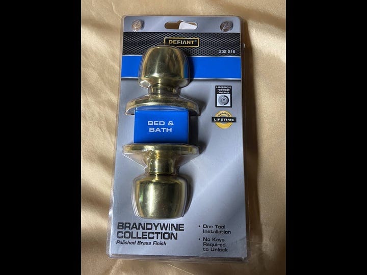 defiant-brandywine-polished-brass-bed-bath-privacy-door-knob-1