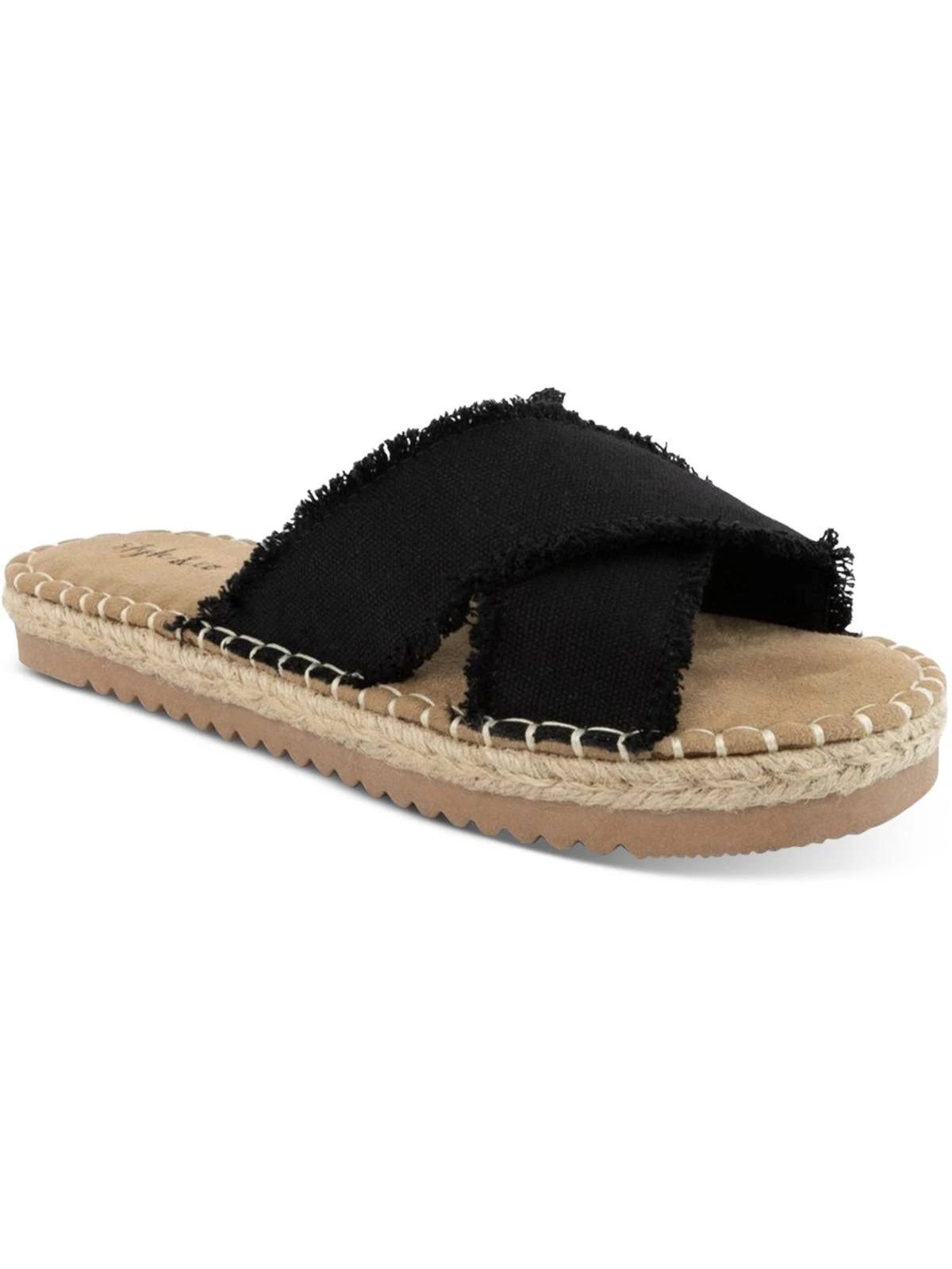 Affordable women's chic criss-cross slide sandals in black canvas | Image