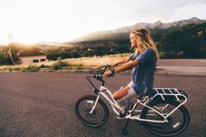 blonde riding bike