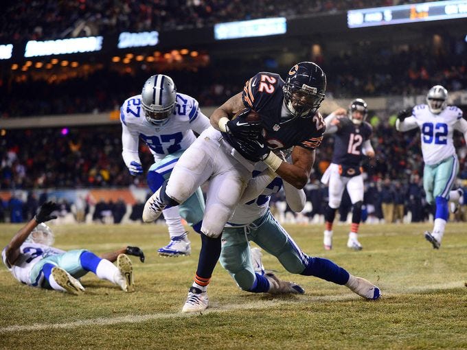 Chicago Bears running back Matt Forte (22) rushes into the end zone for a touchdown during the third quarter against the Dallas Cowboys at Soldier Field.