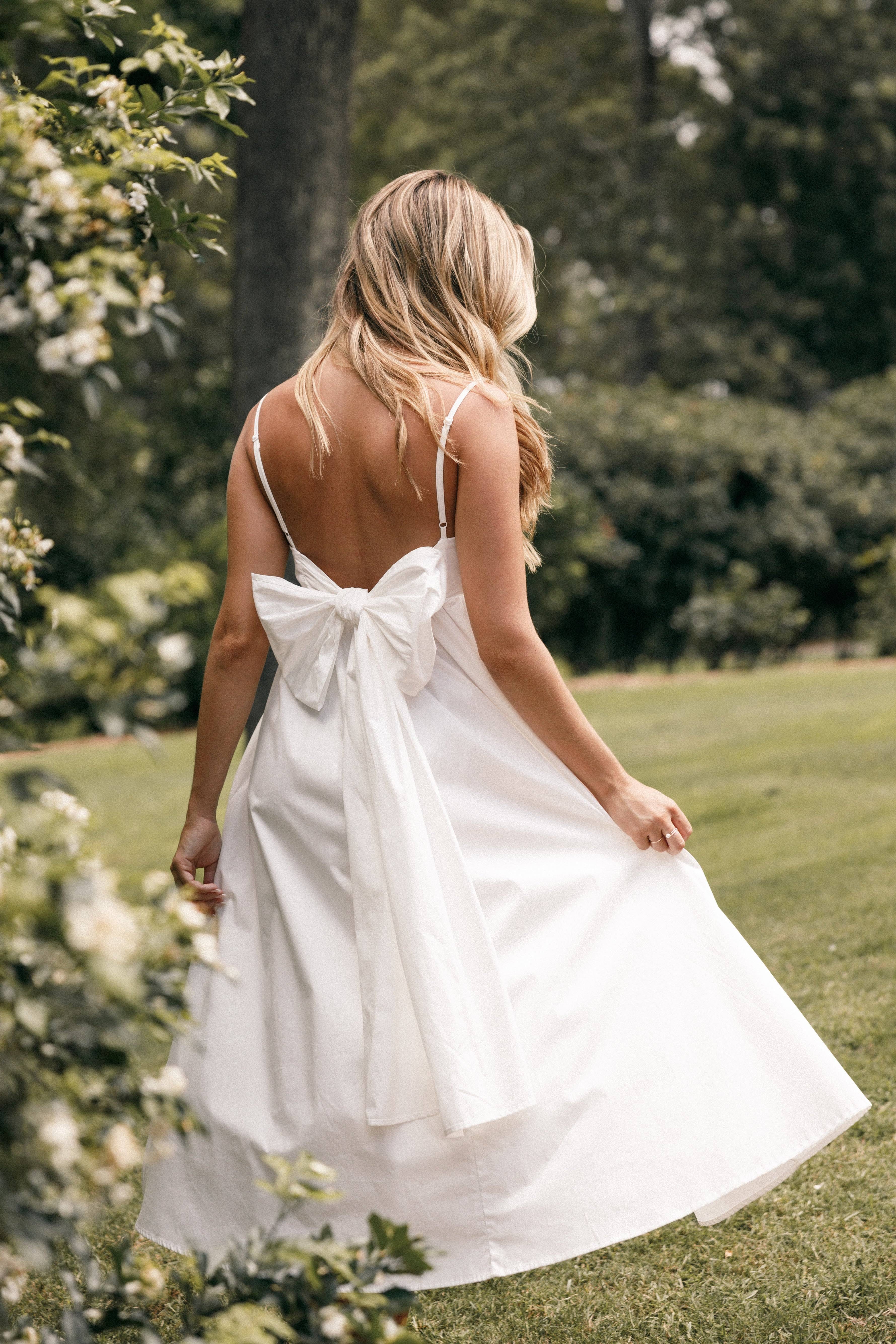 Attractive White Midi Dress with Bow Back | Image