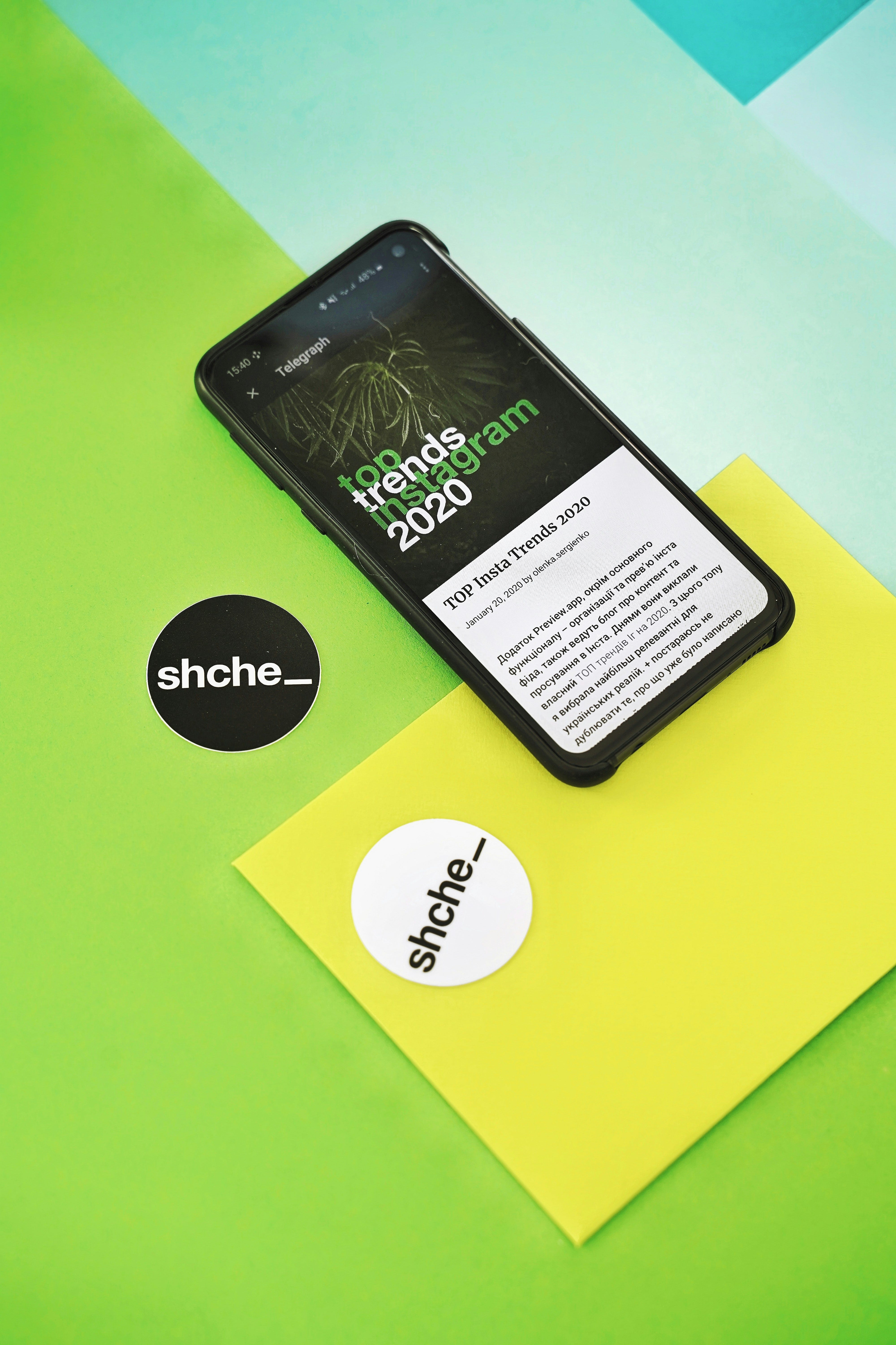 black iphone 7 on green table