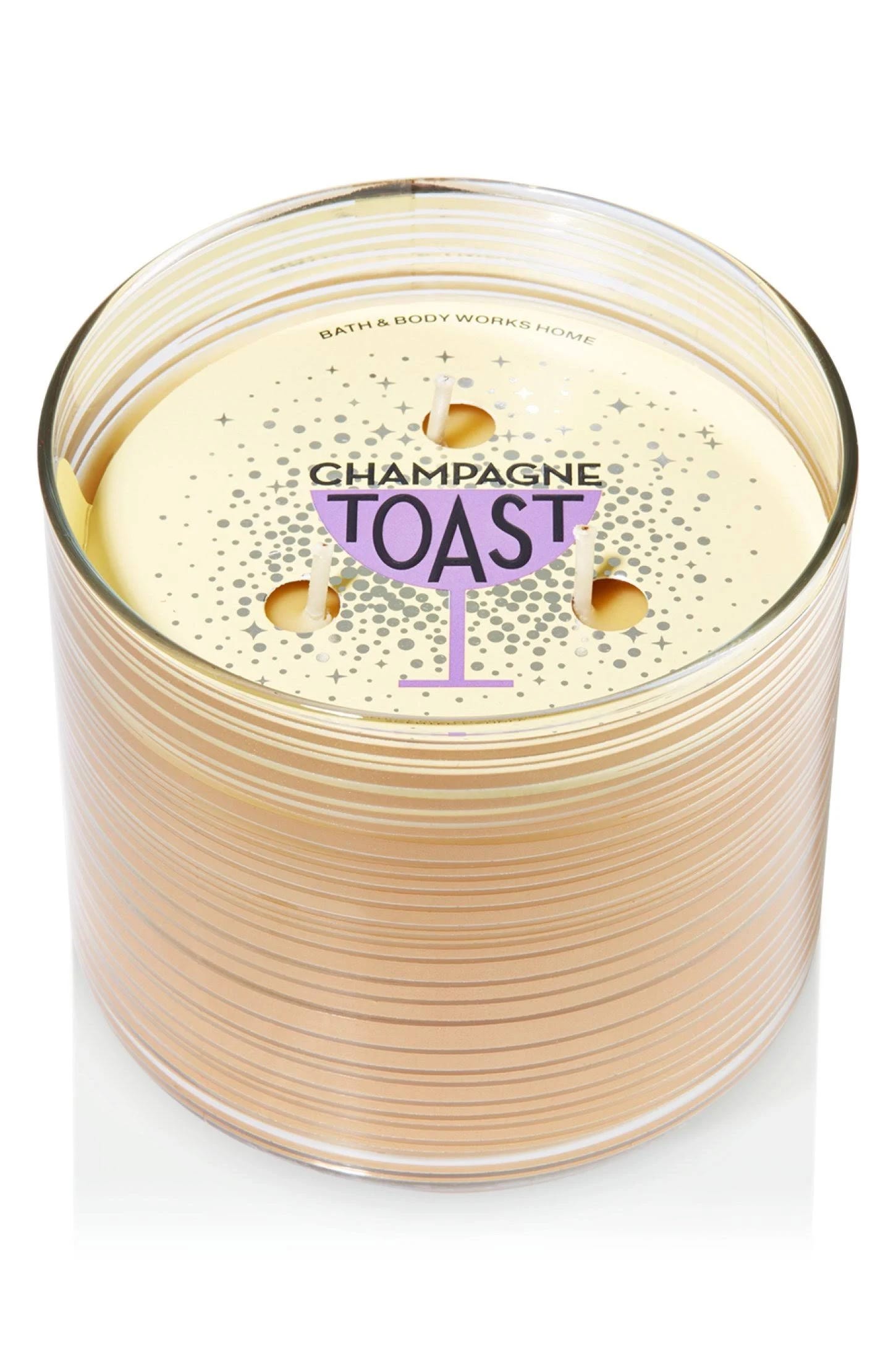 White Barn Accents: Champagne Toast Gold Candle (14.5 oz) | Image