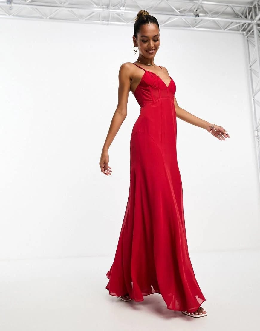 Elegant Red Corseted Gown with Exquisite Craftsmanship | Image