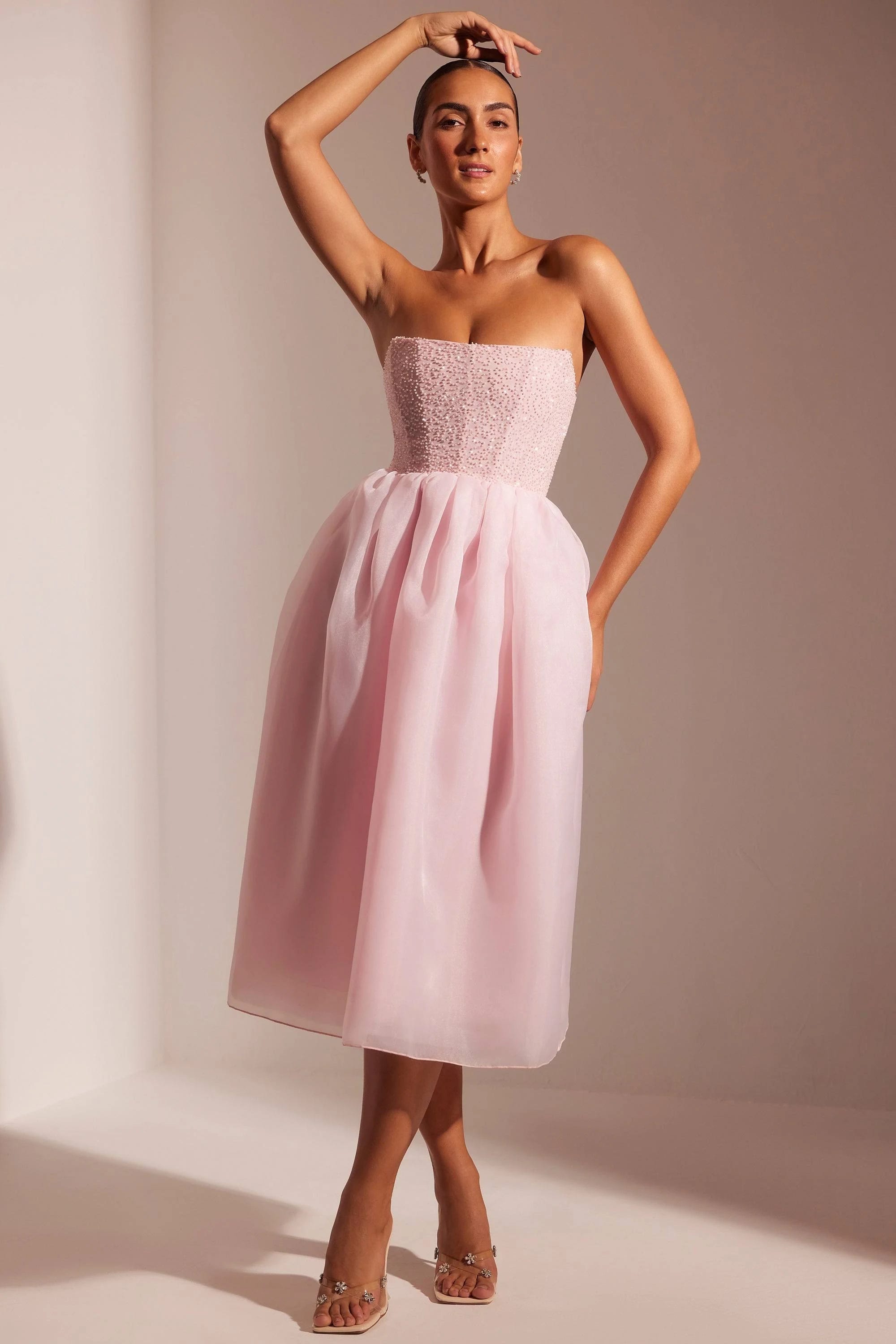 Elegant Rosette Midi Dress with Embellished Corset Skirt and Blush Colored Tone | Image