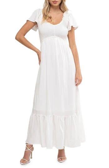 Elegant White Midi Dress with Empire Waist and Flutter Sleeves | Image