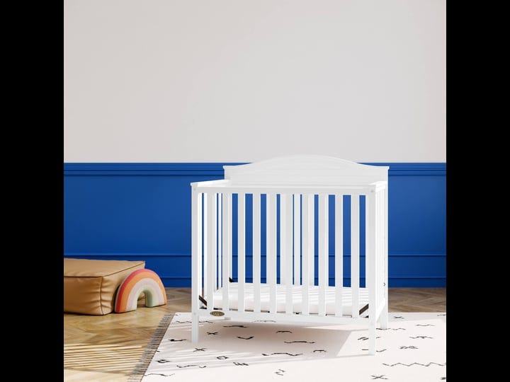 graco-stella-4-in-1-convertible-mini-crib-white-1