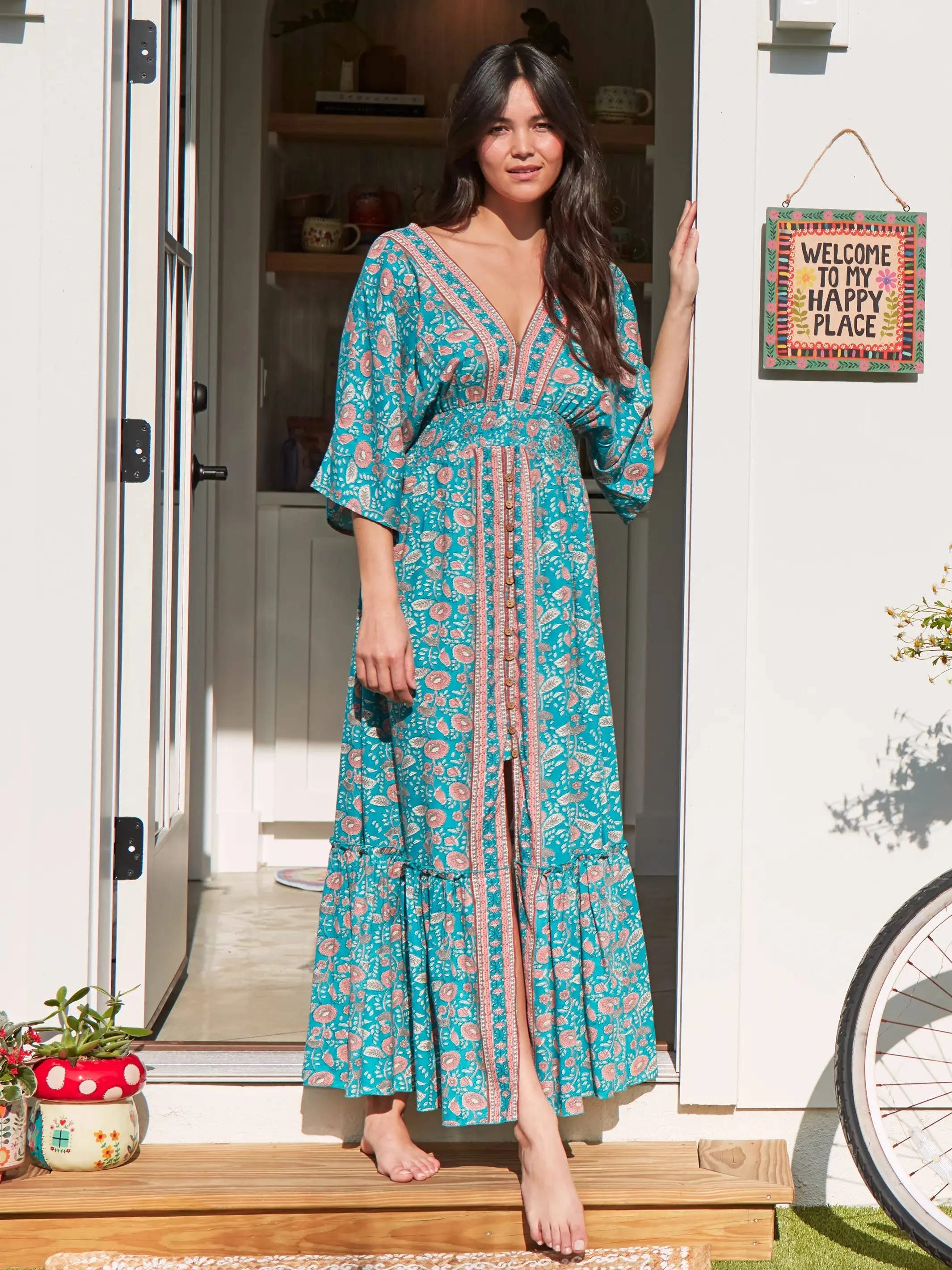 Vibrant Teal Floral Maxi Dress from Natural Life | Image