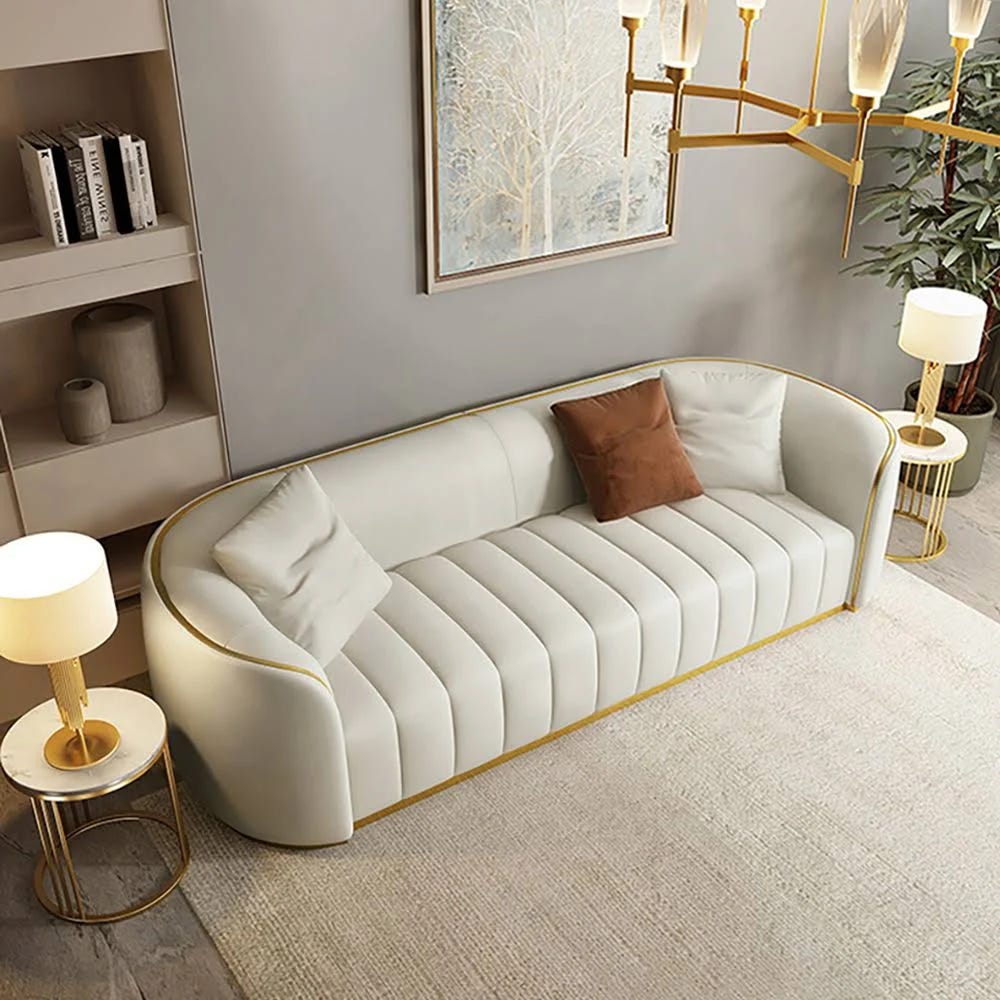 White Three-Seater Sofa, Stylish Gold Stainless Steel Base, Luxurious Faux Leather Upholstery | Image