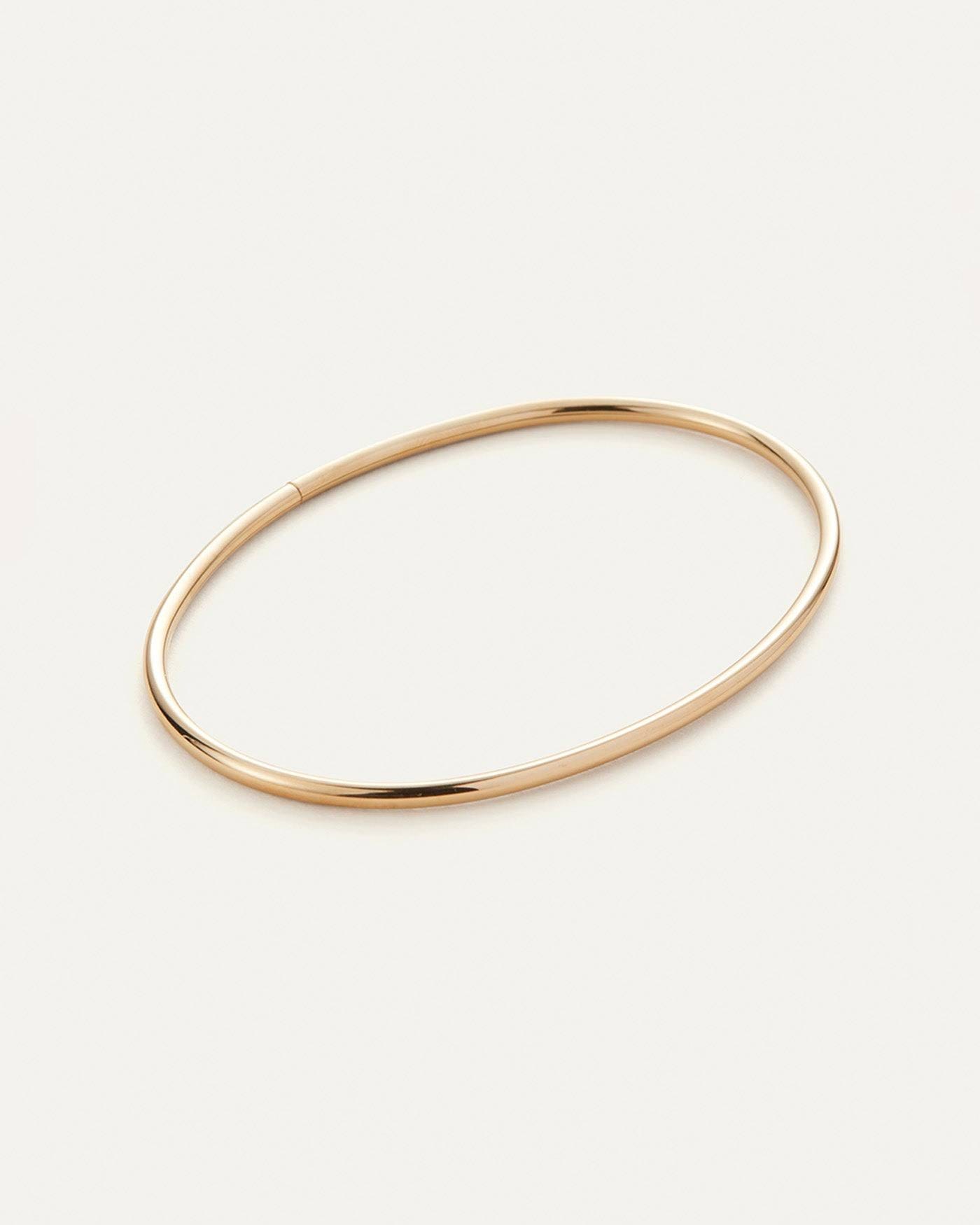 Stylish Gold Anklet with Signature Lock Closure | Image