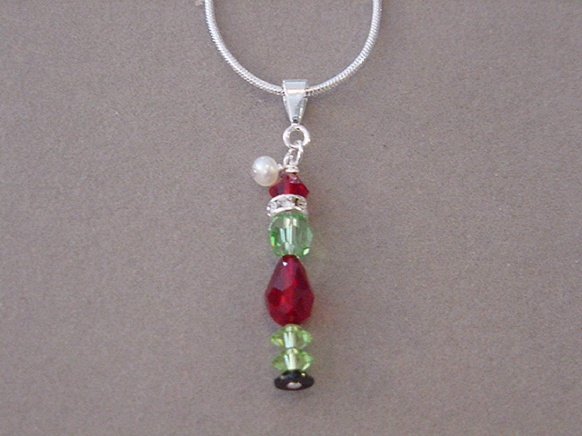 Crystal GRINCH NECKLACE Christmas Jewelry Grinch Pendant Necklace Made with Swarovski crystals silver Plated