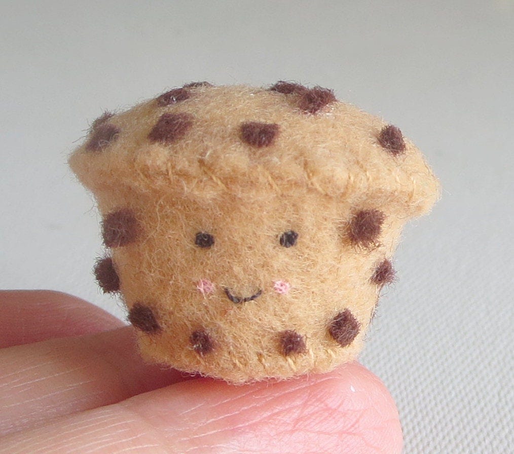 Chocolate chip muffin miniature felt play food stuffed toy with smiling face
