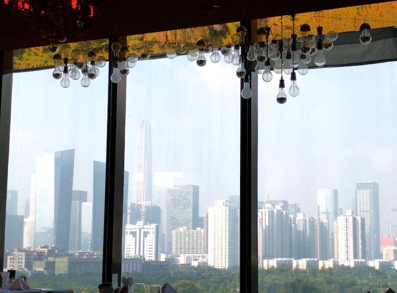 The hazy Shenzhen skyline as seen from our hotel in November 2016. Image: Peter Bihr (CC by-nc-sa)