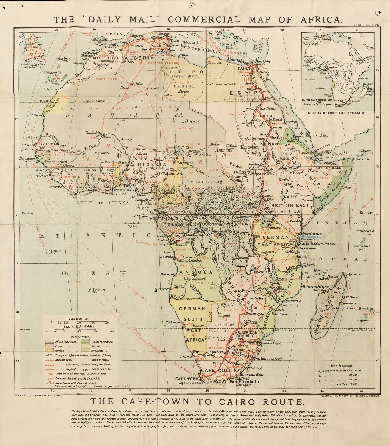 A coloured map of Africa showing land claimed by European nations including British, German, French and Portuguese possessions. Natural resources found in each region are also identified including ivory, palm oil, rubber, iron and copper. The partially completed Cape-town to Cairo railway route is also included.